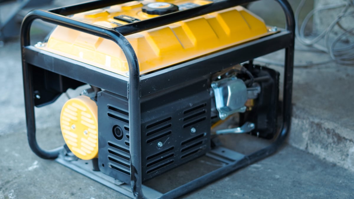 Yellow portable generator on-site — typical home backup unit serviced by Maple Valley mobile repair